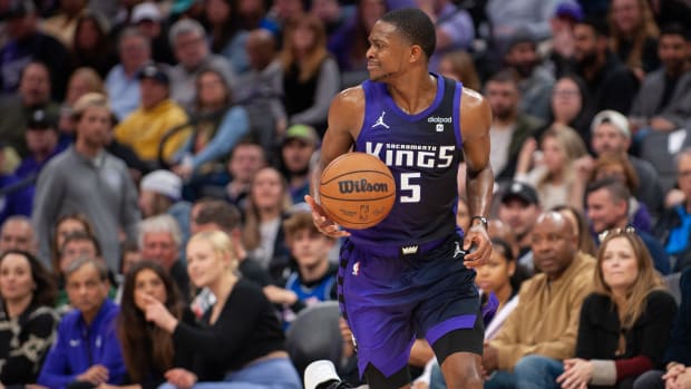 Mar 12, 2024; Sacramento, California, USA; Sacramento Kings guard De'Aaron Fox (5) pushes the ball up the court during the fourth quarter at Golden 1 Center. Mandatory Credit: Ed Szczepanski-USA TODAY Sports